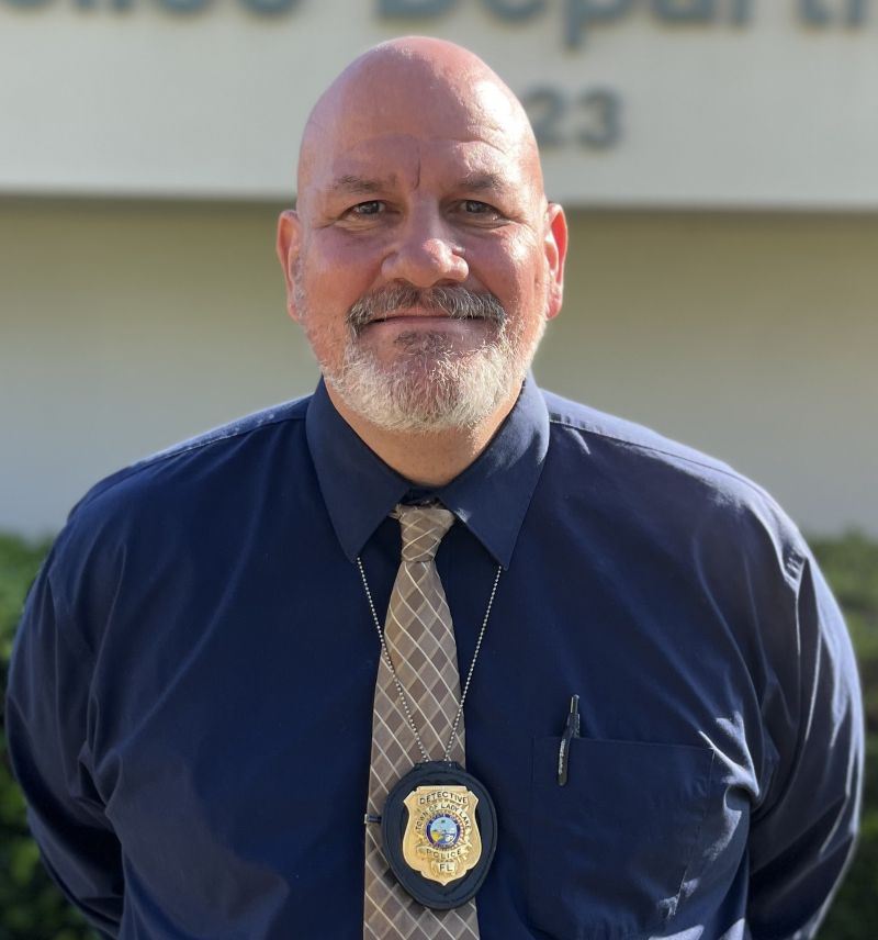Smiling male police officer