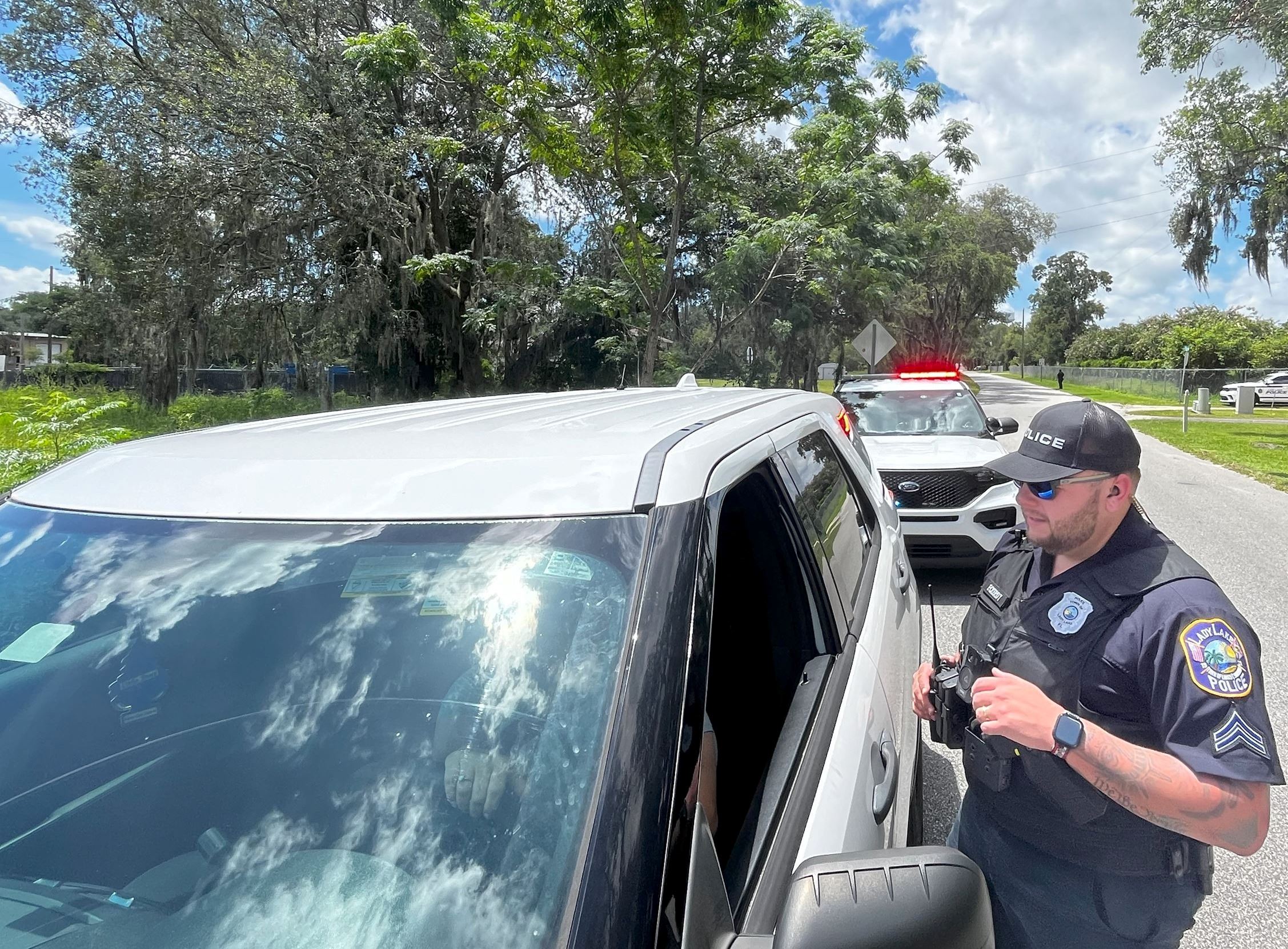 Police officer pulls over a car